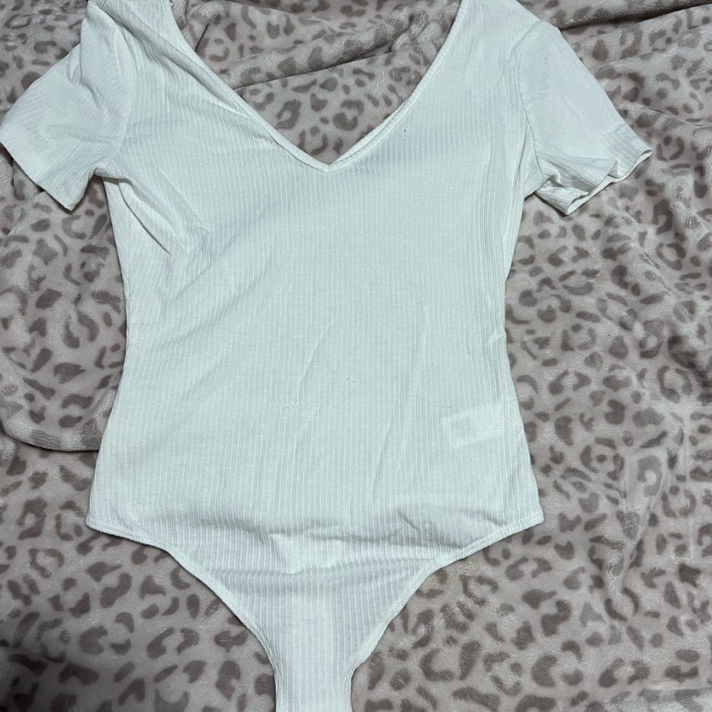 Grey body suit thong